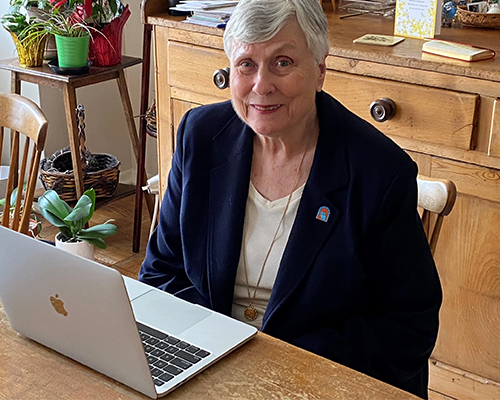 ARC member sitting at a desk
